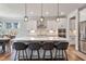 Open kitchen with large island and stainless steel appliances at 88 Capewood Ct, Garner, NC 27529