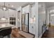 Modern kitchen with stainless steel appliances and white cabinetry at 88 Capewood Ct, Garner, NC 27529