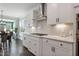 Spacious kitchen with gas cooktop and island, open to dining area at 88 Capewood Ct, Garner, NC 27529