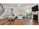 Spacious living room, featuring hardwood floors and a fireplace at 88 Capewood Ct, Garner, NC 27529
