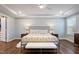 Spacious main bedroom with hardwood floors and large windows at 88 Capewood Ct, Garner, NC 27529