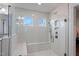 Large walk-in shower with herringbone tile and built-in bench at 88 Capewood Ct, Garner, NC 27529