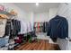 Organized walk-in closet with hanging rods and shelving at 88 Capewood Ct, Garner, NC 27529
