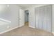 Bedroom with gray closet doors and carpeted floor at 103 Marion Dr, Erwin, NC 28339