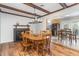 Dining room with wood table and chairs, and a fireplace at 103 Marion Dr, Erwin, NC 28339