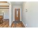 Bright entryway with hardwood floors and wood door at 103 Marion Dr, Erwin, NC 28339