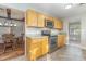 Kitchen with wood cabinets and stainless steel appliances at 103 Marion Dr, Erwin, NC 28339