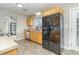 Kitchen with wood cabinets, stainless steel appliances, and tile floor at 103 Marion Dr, Erwin, NC 28339