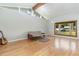 Living room with hardwood floors and large window at 103 Marion Dr, Erwin, NC 28339