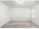 Simple bedroom with neutral walls and carpeting at 1039 Brockton Dr, Mebane, NC 27302