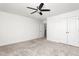 Spacious bedroom with ceiling fan and neutral carpet at 1039 Brockton Dr, Mebane, NC 27302