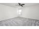 Bright bedroom with ceiling fan and neutral carpeting at 1039 Brockton Dr, Mebane, NC 27302