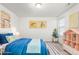 Bedroom with blue bedding and playful decor at 1039 Brockton Dr, Mebane, NC 27302