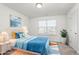 Bright bedroom with a double bed, window, and stylish decor at 1039 Brockton Dr, Mebane, NC 27302