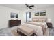 Main bedroom with plush bed and neutral decor at 1039 Brockton Dr, Mebane, NC 27302