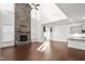 Spacious great room with a stone fireplace and high ceilings at 1039 Brockton Dr, Mebane, NC 27302