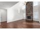 Open living space featuring a large stone fireplace at 1039 Brockton Dr, Mebane, NC 27302