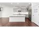 Modern kitchen with gray cabinets, quartz countertops and island at 1039 Brockton Dr, Mebane, NC 27302