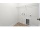Laundry room with built-in shelving at 1039 Brockton Dr, Mebane, NC 27302