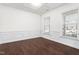 Bright office with hardwood floors, wainscoting, and two windows with blinds at 1039 Brockton Dr, Mebane, NC 27302
