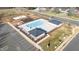 Community pool with adjacent playground at 1039 Brockton Dr, Mebane, NC 27302