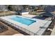 Community pool with a large sundeck at 1039 Brockton Dr, Mebane, NC 27302