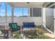 Screened porch with outdoor furniture and string lights at 1039 Brockton Dr, Mebane, NC 27302