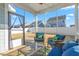 Relaxing screened porch with seating and backyard view at 1039 Brockton Dr, Mebane, NC 27302
