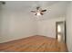 Bedroom features vaulted ceiling, hardwood floors and ceiling fan at 121 Lumina Pl, Holly Springs, NC 27540