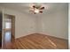 Bedroom with hardwood floors, and double closet at 121 Lumina Pl, Holly Springs, NC 27540