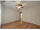 Bedroom with hardwood floors, and double closet at 121 Lumina Pl, Holly Springs, NC 27540