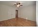 Bedroom with hardwood floors, and double closet at 121 Lumina Pl, Holly Springs, NC 27540