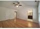 Bedroom features vaulted ceiling, ceiling fan and bathroom view at 121 Lumina Pl, Holly Springs, NC 27540