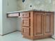 Close up of the built in desk area in the kitchen with wooden cabinets and granite countertops at 121 Lumina Pl, Holly Springs, NC 27540
