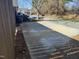 Long driveway leading to homes along a wooded street at 121 Lumina Pl, Holly Springs, NC 27540