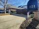 Exterior shot of home with mailbox with house number along driveway at 121 Lumina Pl, Holly Springs, NC 27540