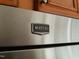 A close-up of a Maytag refrigerator with stainless steel finish and dark trim at 121 Lumina Pl, Holly Springs, NC 27540