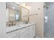 Bright bathroom featuring double vanity with white marble countertops and sleek brass finishes at 1820 Johnson Rd, Burlington, NC 27217