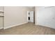 Comfortable bedroom with modern wood flooring and adjacent closet at 1820 Johnson Rd, Burlington, NC 27217