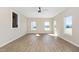 Bright, neutral living room offers plenty of natural light and open space at 1820 Johnson Rd, Burlington, NC 27217