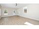 Spacious living room with natural light and modern ceiling fan at 1820 Johnson Rd, Burlington, NC 27217