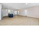 Spacious living room, seamlessly connecting the kitchen and other living spaces with lots of natural light at 1820 Johnson Rd, Burlington, NC 27217