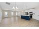 Open living space with recessed lighting, wood floors, and seamless access to the modern kitchen at 1820 Johnson Rd, Burlington, NC 27217