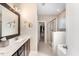 Elegant bathroom with double vanity, soaking tub, and walk-in shower at 201 Laurel Oaks Dr, Youngsville, NC 27596
