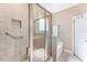 Clean bathroom with shower/tub combo and tile surround at 201 Laurel Oaks Dr, Youngsville, NC 27596