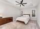 Bright bedroom with hardwood floors, ceiling fan, and ample closet space at 201 Laurel Oaks Dr, Youngsville, NC 27596