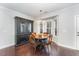 Cozy dining area with hardwood floors and a bay window at 201 Laurel Oaks Dr, Youngsville, NC 27596
