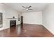 Spacious living area with hardwood floors, fireplace, and shiplap accent wall at 201 Laurel Oaks Dr, Youngsville, NC 27596