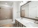 Bathroom with double vanity, tub, and shower at 2029 Maggie Valley Dr, Apex, NC 27502