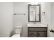 Clean bathroom with modern vanity and a large mirror at 2029 Maggie Valley Dr, Apex, NC 27502